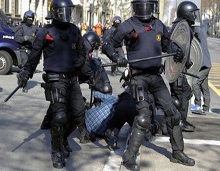 Spanish police beats demonstrators